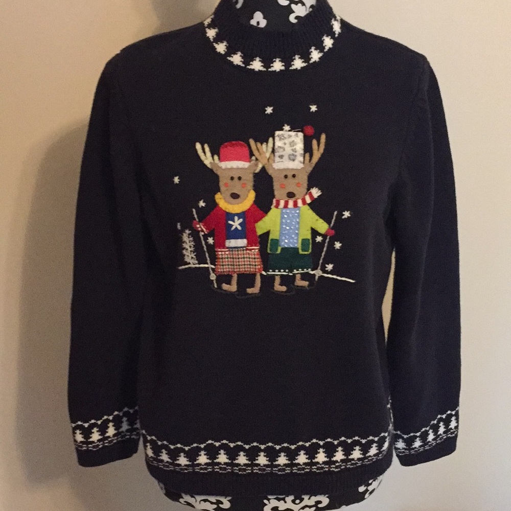 Navy Reindeer sweater by Christopher and Banks.